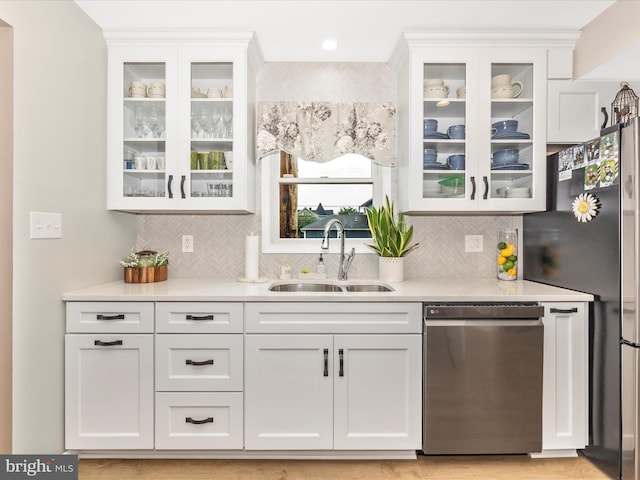 41 E Frederick St, Williamsport, MD 21795 - kitchen with appliances with stainless steel finishes, a sink, and white cabinetry