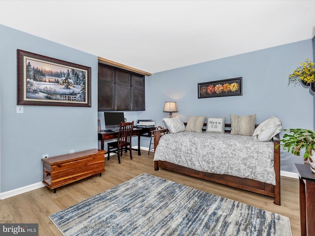 41 E Frederick St, Williamsport, MD 21795 - bedroom featuring light wood finished floors, baseboards, and an office area