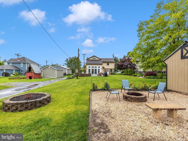 41 E Frederick St, Williamsport, MD 21795 - view of green lawn featuring an outdoor fire pit