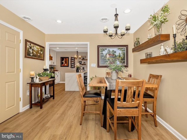 41 E Frederick St, Williamsport, MD 21795 - dining area with a chandelier, light wood finished floors, baseboards, and recessed lighting