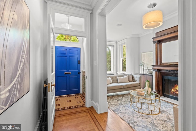 121 V St NW, Washington, DC 20001 - entryway with crown molding and a lit fireplace