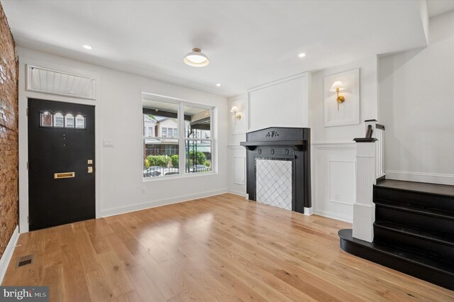 1740 N 61st St, Philadelphia, PA 19151 - foyer featuring light wood-style floors, a fireplace, stairs, recessed lighting, and baseboards