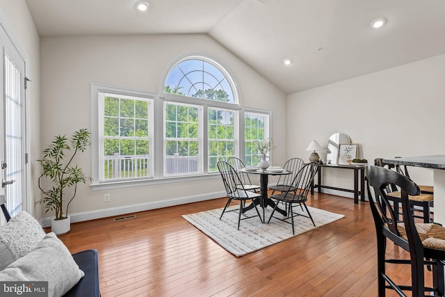 4403 Cedar Reach Ln, Bowie, MD 20720 - dining area featuring plenty of natural light, vaulted ceiling, hardwood / wood-style flooring, and recessed lighting