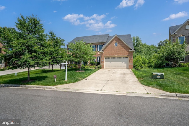 4403 Cedar Reach Ln, Bowie, MD 20720 - traditional-style house with an attached garage, a front yard, driveway, and brick siding