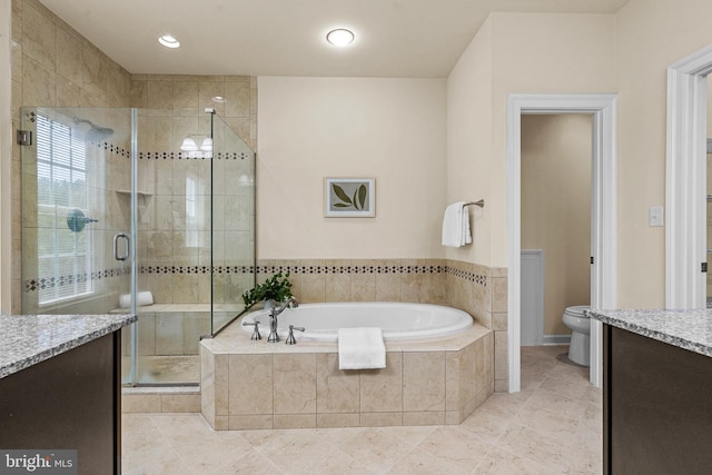4403 Cedar Reach Ln, Bowie, MD 20720 - full bathroom with vanity, a garden tub, a shower stall, and tile patterned floors