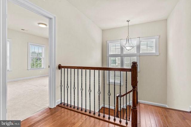 4403 Cedar Reach Ln, Bowie, MD 20720 - stairs featuring hardwood / wood-style floors and baseboards