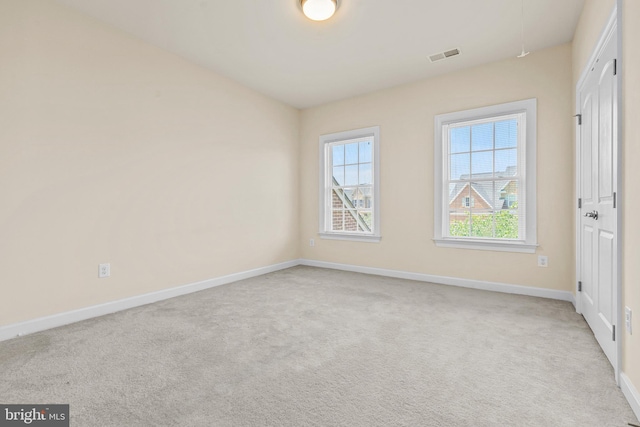 4403 Cedar Reach Ln, Bowie, MD 20720 - spare room with baseboards and light colored carpet
