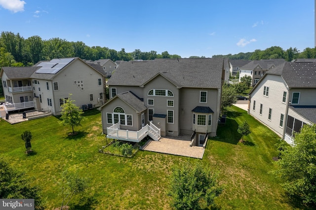 4403 Cedar Reach Ln, Bowie, MD 20720 - rear view of house with a residential view, a patio area, a wooden deck, and a yard