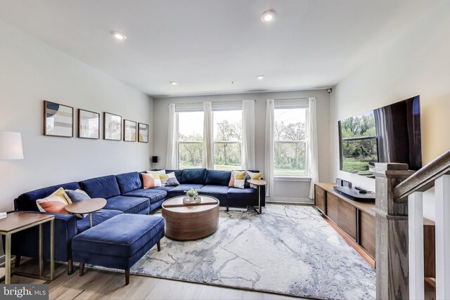 2509 River Terrace Rd, Hyattsville, MD 20782 - living area featuring healthy amount of natural light, wood finished floors, and recessed lighting