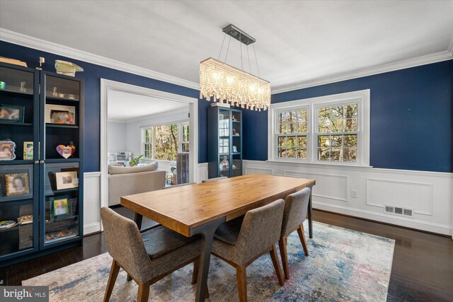 1426 Highwood Dr, Mclean, VA 22101 - dining space featuring a chandelier, a wainscoted wall, dark wood-style flooring, and crown molding
