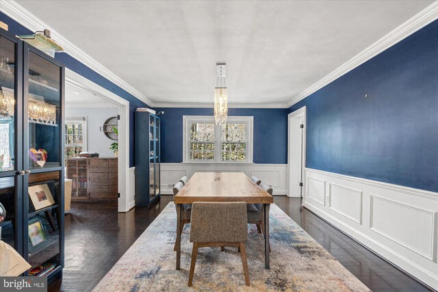1426 Highwood Dr, Mclean, VA 22101 - dining room featuring plenty of natural light, a wainscoted wall, dark wood-style floors, crown molding, and a chandelier