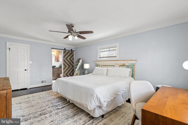 1426 Highwood Dr, Mclean, VA 22101 - bedroom with a barn door, ornamental molding, wood finished floors, baseboards, and a ceiling fan