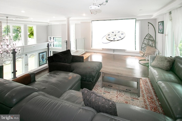 2001 Army Navy Dr, Arlington, VA 22202 - living room featuring wood finished floors, a chandelier, decorative columns, and recessed lighting