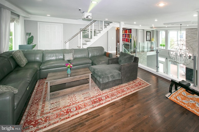 2001 Army Navy Dr, Arlington, VA 22202 - living area featuring a chandelier, stairs, hardwood / wood-style floors, recessed lighting, and ornamental molding