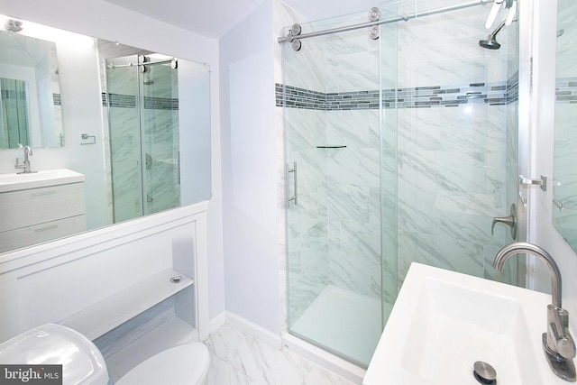 2001 Army Navy Dr, Arlington, VA 22202 - full bath featuring toilet, a marble finish shower, vanity, and marble look tiles