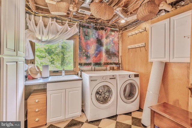 1534 Circle Dr, Annapolis, MD 21409 - laundry room featuring cabinet space, light floors, and independent washer and dryer