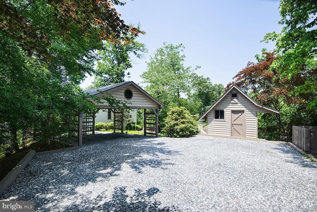 1534 Circle Dr, Annapolis, MD 21409 - view of yard featuring stairway, gravel driveway, and an outbuilding