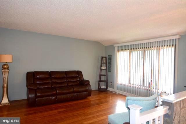 7 Caldwell Ave, Marlton, NJ 08053 - living room featuring wood finished floors and a textured ceiling