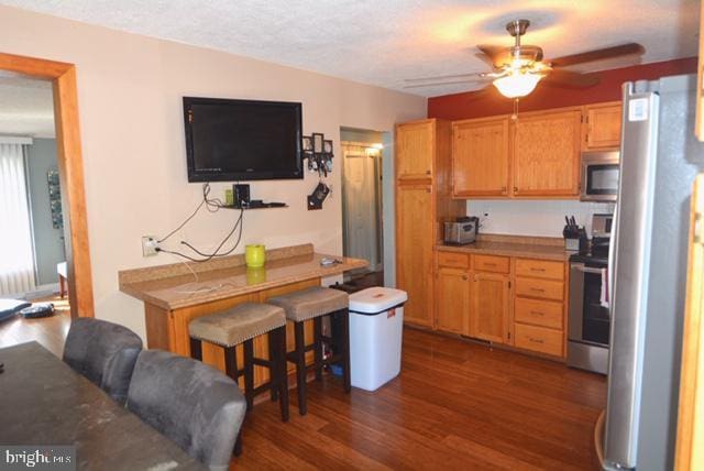 7 Caldwell Ave, Marlton, NJ 08053 - kitchen featuring stainless steel appliances, a ceiling fan, and dark wood-type flooring