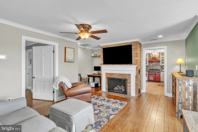 65 Hillcrest Ln, North East, MD 21901 - living room with hardwood / wood-style floors, a ceiling fan, a brick fireplace, ornamental molding, and recessed lighting