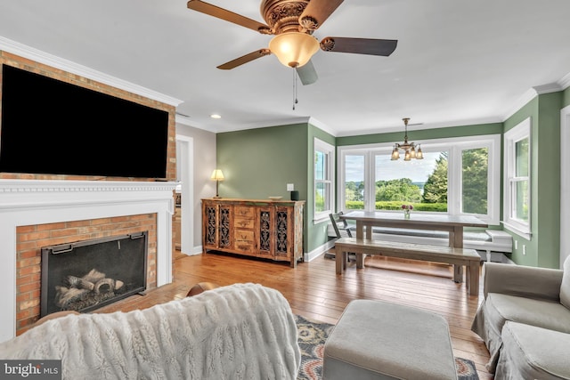 65 Hillcrest Ln, North East, MD 21901 - living area with hardwood / wood-style floors, ornamental molding, baseboards, ceiling fan, and a fireplace