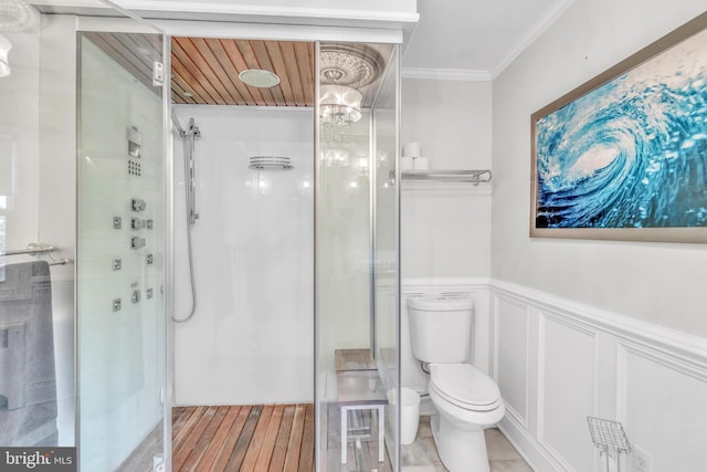 65 Hillcrest Ln, North East, MD 21901 - full bathroom featuring a stall shower, toilet, crown molding, a wainscoted wall, and wood finished floors
