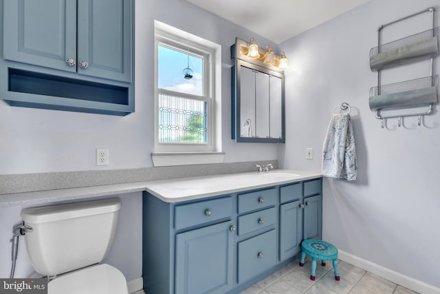 65 Hillcrest Ln, North East, MD 21901 - bathroom featuring toilet, vanity, baseboards, and tile patterned floors
