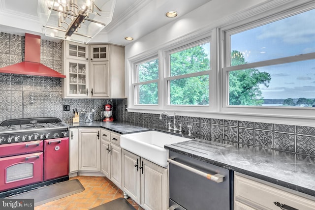 65 Hillcrest Ln, North East, MD 21901 - kitchen featuring dishwasher, range with two ovens, a sink, wall chimney exhaust hood, and brick floors