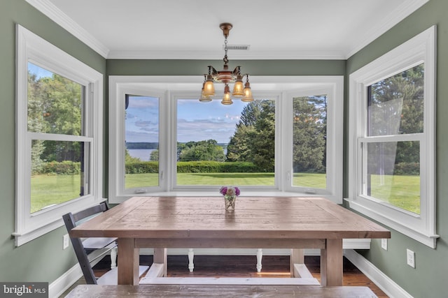 65 Hillcrest Ln, North East, MD 21901 - unfurnished dining area with a chandelier, plenty of natural light, breakfast area, baseboards, and ornamental molding