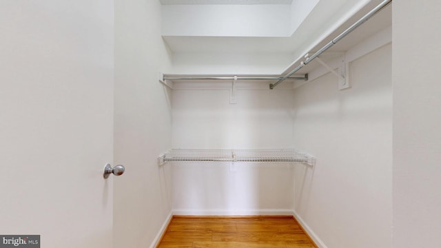 1808 Old Meadow Rd Unit 1015, Mclean, VA 22102 - spacious closet featuring light wood-style flooring