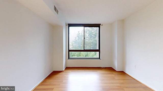 1808 Old Meadow Rd Unit 1015, Mclean, VA 22102 - unfurnished room featuring light wood-style flooring and baseboards