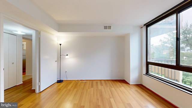 1808 Old Meadow Rd Unit 1015, Mclean, VA 22102 - unfurnished room featuring light wood-style flooring and baseboards