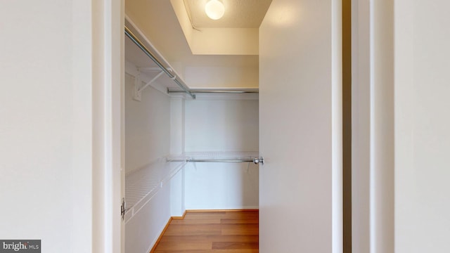 1808 Old Meadow Rd Unit 1015, Mclean, VA 22102 - spacious closet with wood finished floors