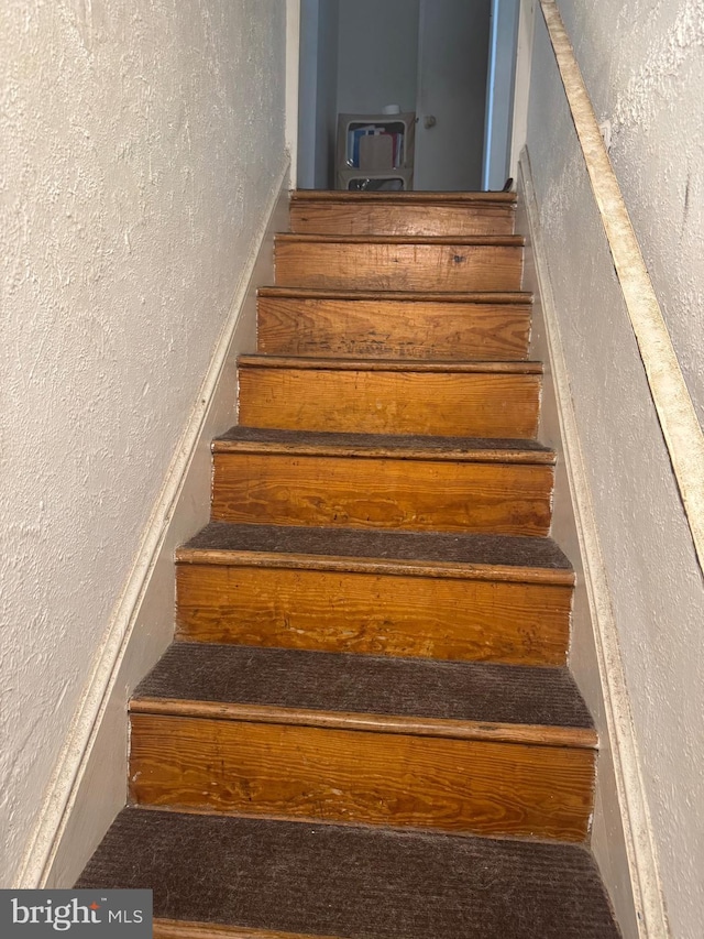 4029 Cedardale Rd, Baltimore, MD 21215 - stairway featuring a textured wall