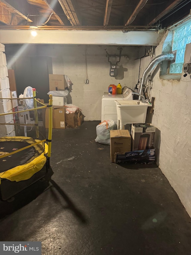 4029 Cedardale Rd, Baltimore, MD 21215 - basement with washer and dryer, a sink, and gas meter