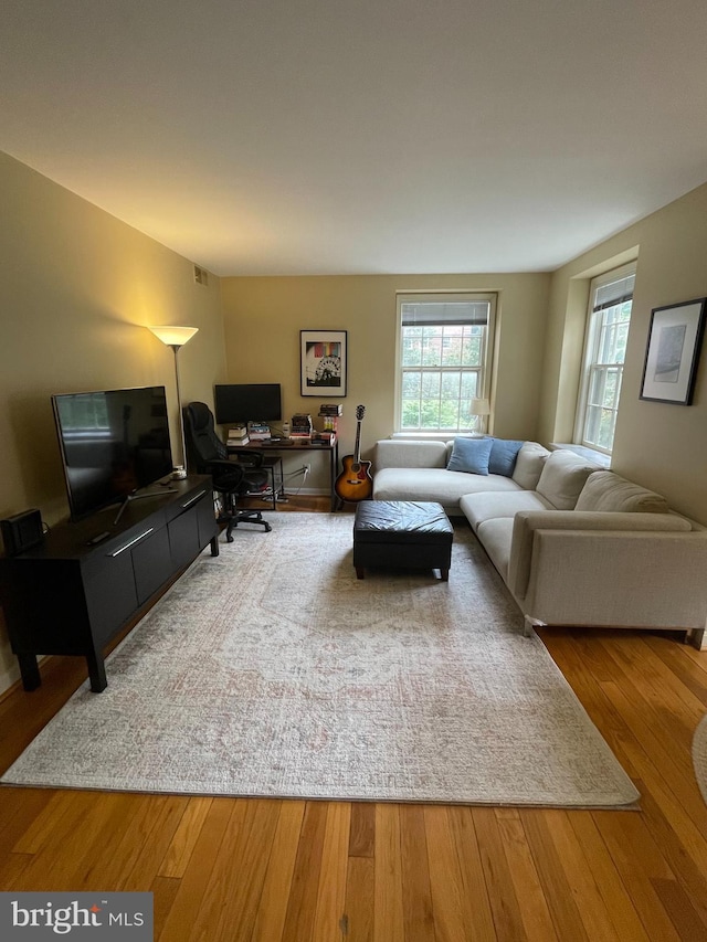 3750 39th St NW Unit C147, Washington, DC 20016 - living room with an office area and wood finished floors