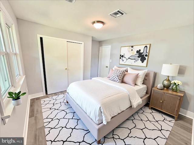 5 Charles Ave, Blackwood, NJ 08012 - bedroom with light wood-style flooring, a closet, and baseboards
