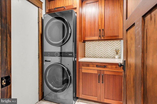 13 Quartz Mill Rd, Newark, DE 19711 - washroom featuring stacked washer / dryer and cabinet space