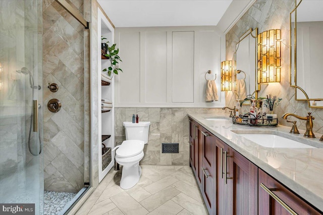13 Quartz Mill Rd, Newark, DE 19711 - bathroom with double vanity, a shower stall, toilet, and marble finish floors