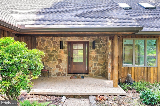 13 Quartz Mill Rd, Newark, DE 19711 - property entrance featuring a shingled roof and stone siding