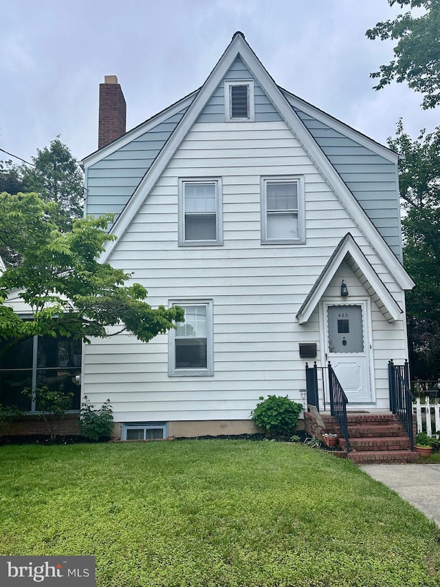 429 Greenway, Ewing, NJ 08618 - view of front facade featuring a chimney, a front lawn, and entry steps