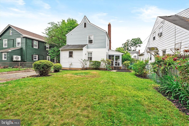 429 Greenway Ave, Ewing, NJ 08618 - rear view of house featuring a chimney