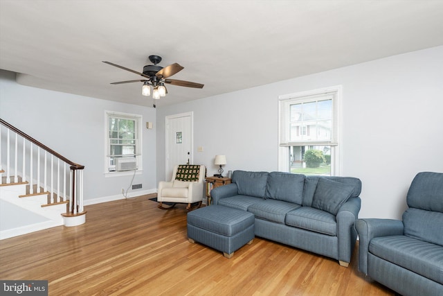 429 Greenway Ave, Ewing, NJ 08618 - living area featuring light wood-style floors, a ceiling fan, cooling unit, stairs, and baseboards