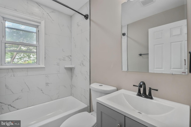 5010 54th Ave, Hyattsville, MD 20781 - bathroom featuring vanity, toilet, and washtub / shower combination