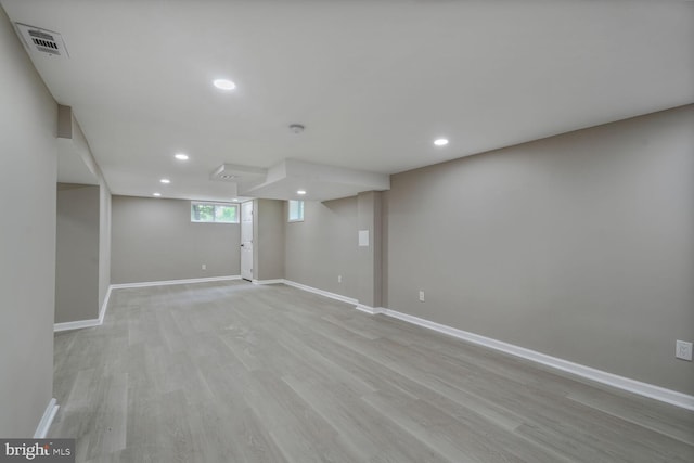 5010 54th Ave, Hyattsville, MD 20781 - basement featuring baseboards, light wood finished floors, and recessed lighting