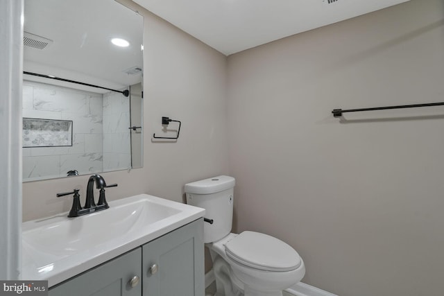 5010 54th Ave, Hyattsville, MD 20781 - bathroom with toilet, vanity, and baseboards