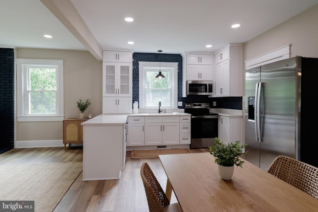 30 Gooney Falls Ln, Front Royal, VA 22630 - kitchen with appliances with stainless steel finishes, plenty of natural light, a sink, white cabinets, and recessed lighting