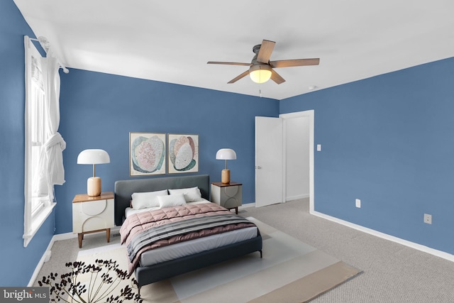 109 E Clement St, Baltimore, MD 21230 - carpeted bedroom with baseboards and a ceiling fan