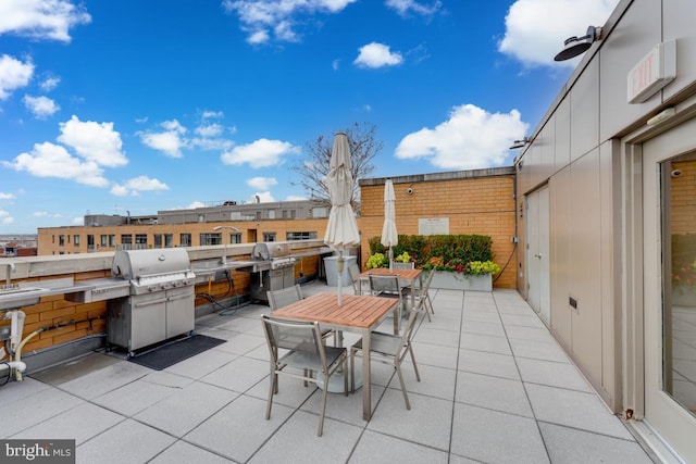 440 L St NW Unit 901, Washington, DC 20001 - view of patio featuring outdoor dining area, grilling area, and a sink