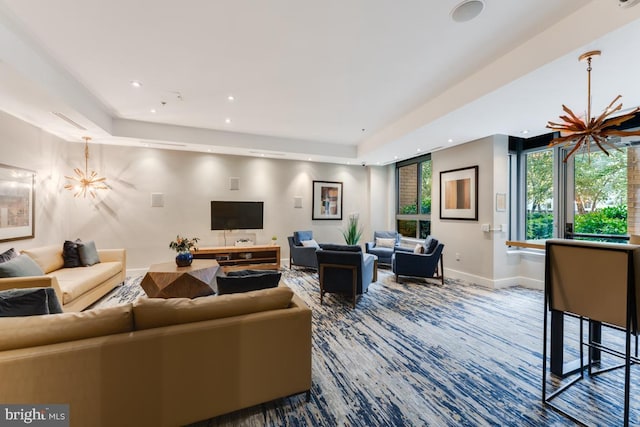 440 L St NW Unit 901, Washington, DC 20001 - living area featuring baseboards, a chandelier, a raised ceiling, and recessed lighting